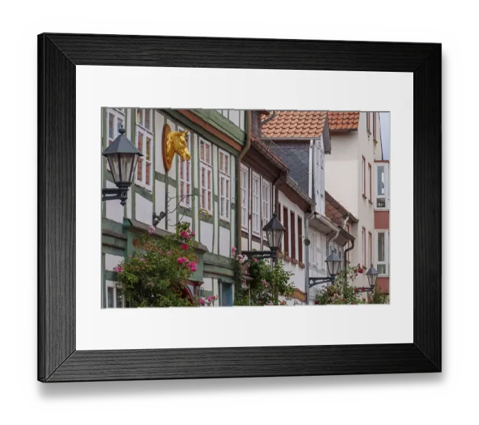 Framed Print : Half-timbered facades with stylish details and golden decoration in a historic setting