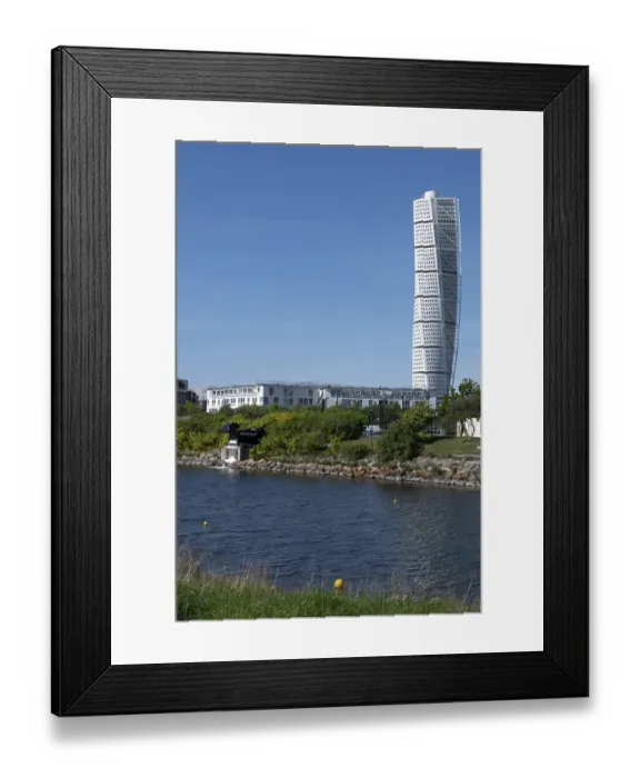 Framed Print : View from Oresundspark over a narrow watercourse of the Turbinkanalen with green banks to the striking