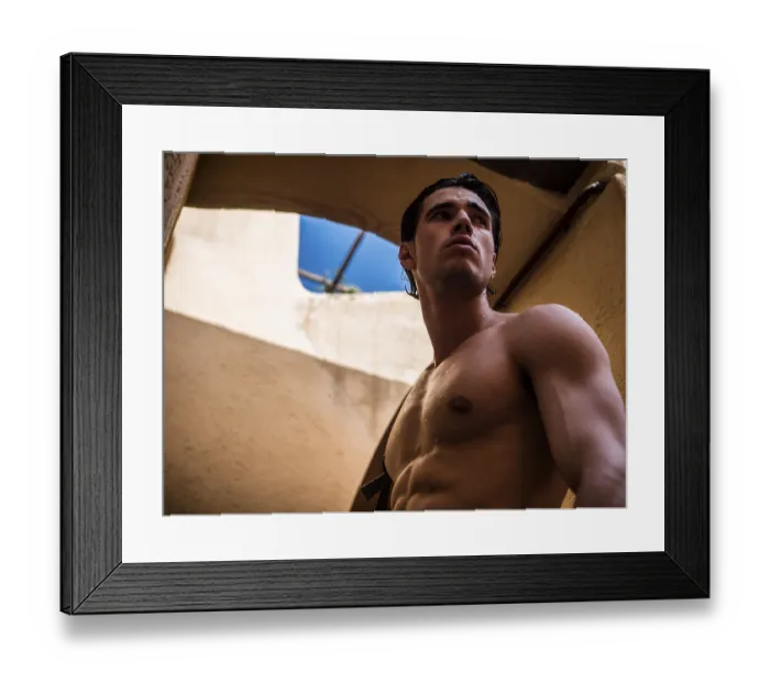 Framed Print : Handsome muscular shirtless man posing in old town alley in Italian town in summer Framed Print : Handsome muscular shirtless man posing in old town alley in Italian town in summer