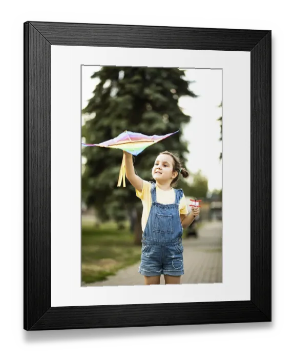 Framed Print : Little cute girl running with kite on summer day in the park outdoor Framed Print : Little cute girl running with kite on summer day in the park outdoor