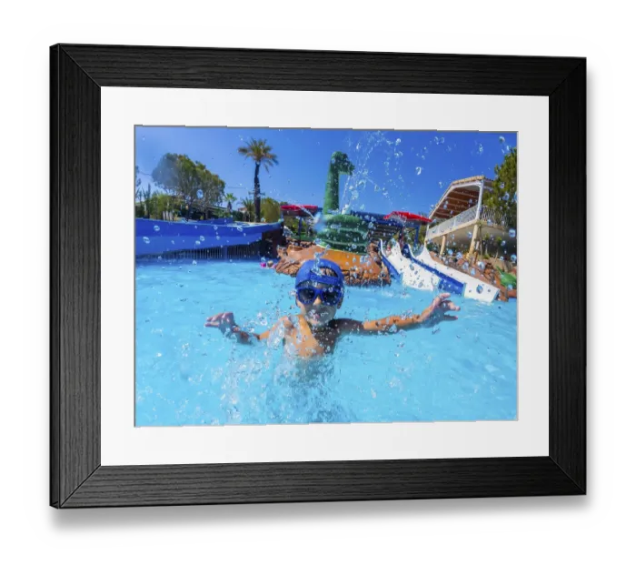 Framed Print : Happy child wearing blue baseball cap and swimming goggles Framed Print : Happy child wearing blue baseball cap and swimming goggles