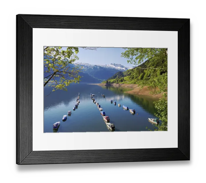 Framed Print : Motorboats moored at the reservoir