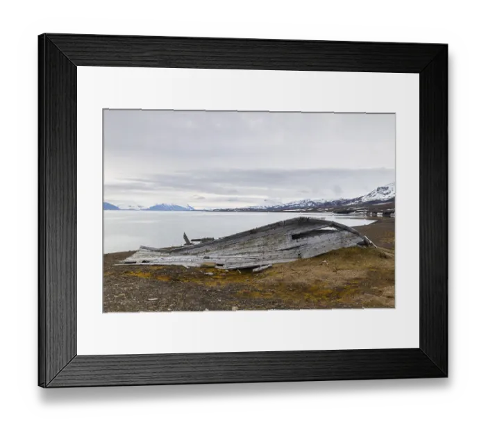 Framed Print : Broken wooden boat on the beach
