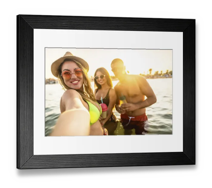 Framed Print : Three friends are taking a selfie while enjoying drinks in the sea during a beach party at sunset Framed Print : Three friends are taking a selfie while enjoying drinks in the sea during a beach party at sunset
