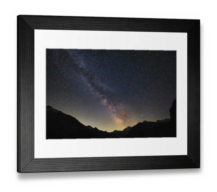Framed Print : The Milky Way illuminates the night sky over the mountains