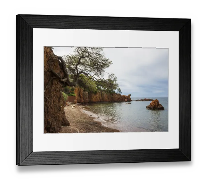 Framed Print : Picturesque beach and red rocks