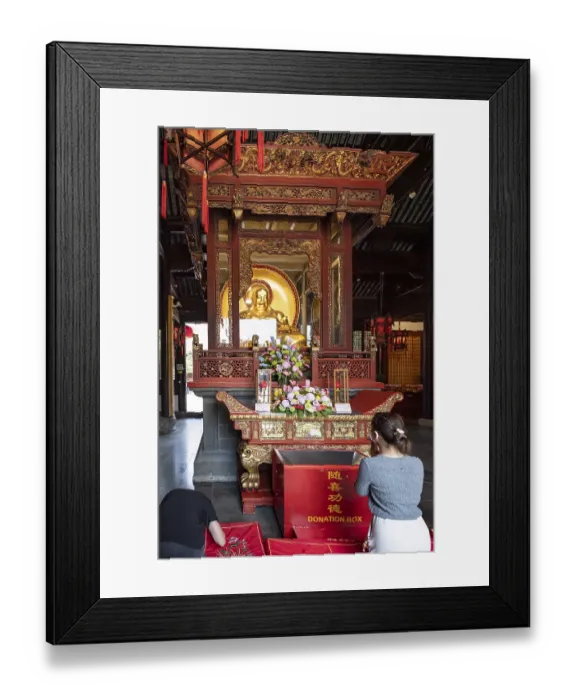 Framed Print : Faithful Buddhists praying, House of Prayer Framed Print : Faithful Buddhists praying, House of Prayer