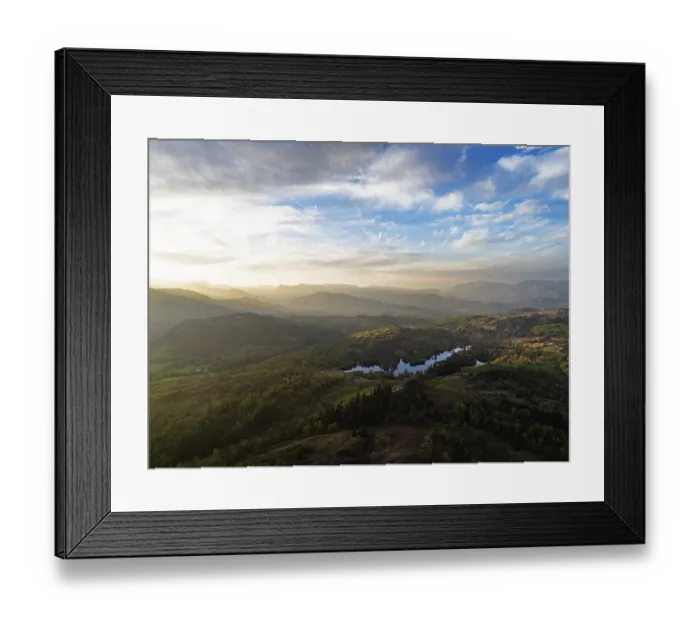 Framed Print : Sunset over Mountains and Coniston Water from drone Framed Print : Sunset over Mountains and Coniston Water from drone