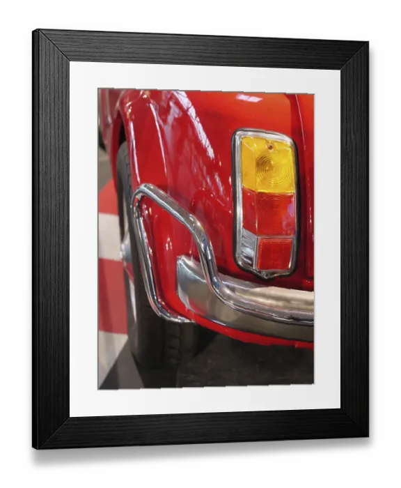 Framed Print : Rear view of a red classic car with characteristic tail lights Framed Print : Rear view of a red classic car with characteristic tail lights