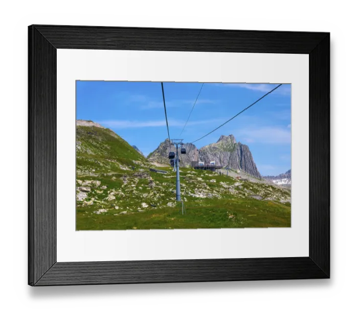 Framed Print : Beautiful Panoramic View over Mountain Peak in the Swiss Alps with Overhead Cable Car Framed Print : Beautiful Panoramic View over Mountain Peak in the Swiss Alps with Overhead Cable Car