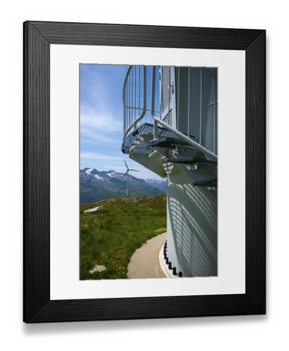 Framed Print : Wind Turbine and Column and Mountain with Glacier in the Swiss Alps and Against Blue Sky