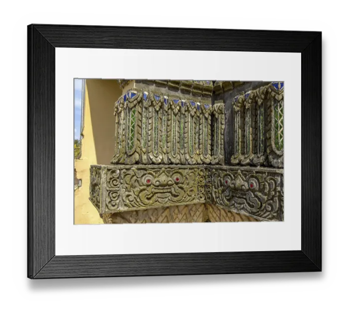 Framed Print : Relief work bas-relief by stonemason on outer wall of Buddhist monastery
