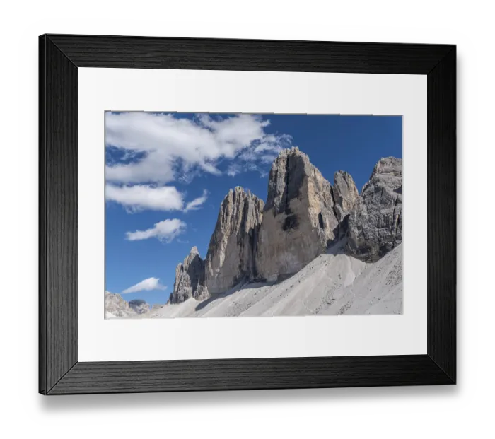 Framed Print : Three Peaks rock formation in front of a blue sky