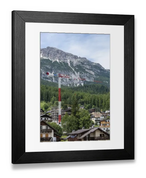 Framed Print : Construction crane against a mountain backdrop in the Dolomites Framed Print : Construction crane against a mountain backdrop in the Dolomites