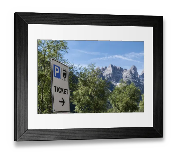 Framed Print : Car park sign in front of a mountain backdrop in the Dolomites