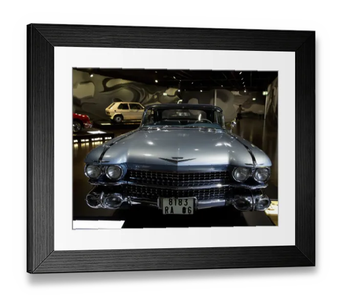 Framed Print : Front view of a blue vintage car with distinctive headlights Framed Print : Front view of a blue vintage car with distinctive headlights