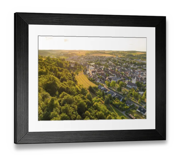 Framed Print : Aerial view of a hilly landscape with dense forest Framed Print : Aerial view of a hilly landscape with dense forest