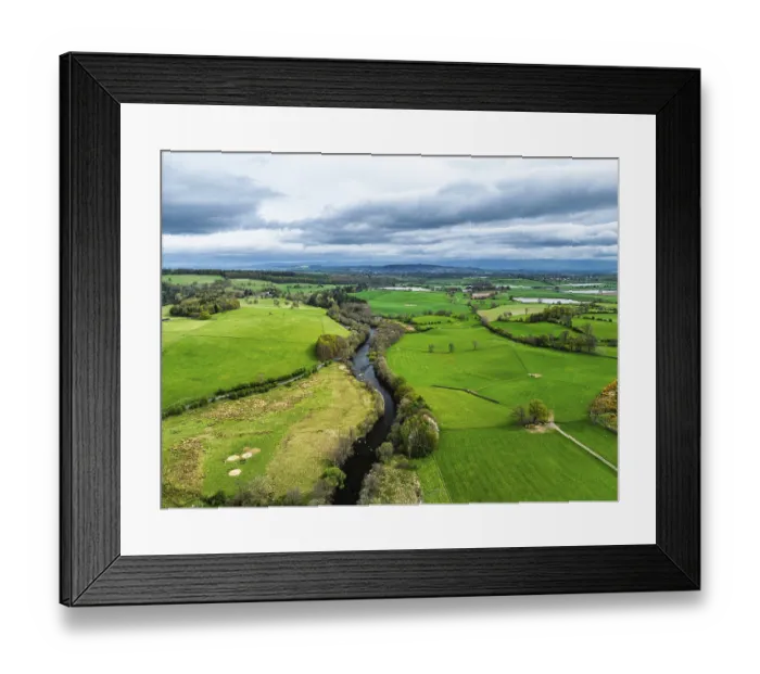 Framed Print : Farms and mountains over Ullswater Lake from drone