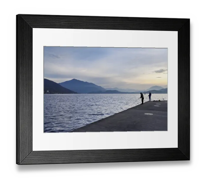 Framed Print : Two fishermen fishing in Lake Zug