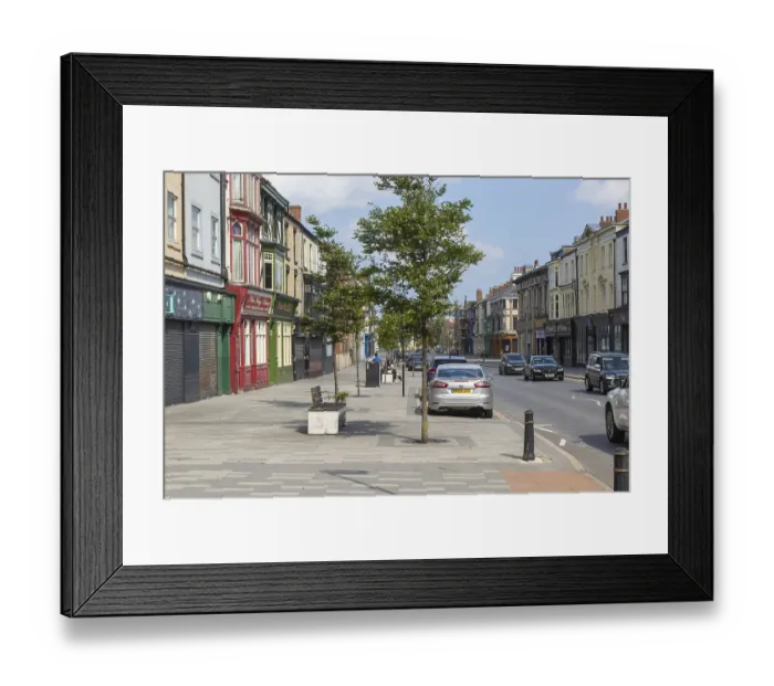 Framed Print : Shops shuttered few people around