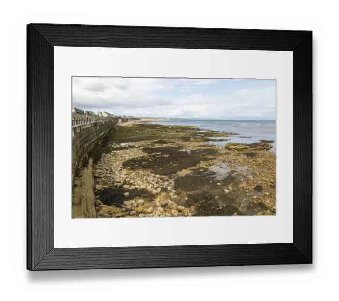 Framed Print : Rocky wave cut platform on coast