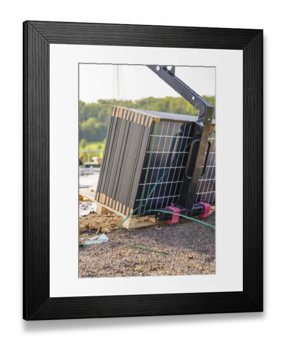 Framed Print : Stacked solar panels on pallets with lifting gear outdoors Framed Print : Stacked solar panels on pallets with lifting gear outdoors
