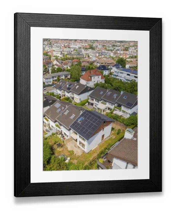 Framed Print : Aerial view of a residential area with various houses with solar modules