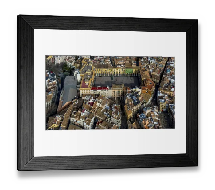 Framed Print : Aerial view, Placa Major, public square with shops and cafes and arts and crafts market Framed Print : Aerial view, Placa Major, public square with shops and cafes and arts and crafts market