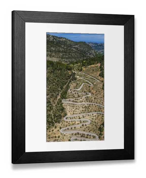 Framed Print : Serpentines in the mountains
