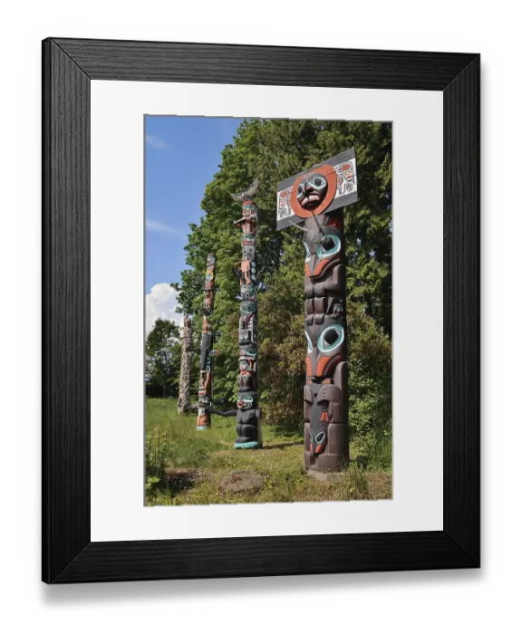 Framed Print : Totem poles, Chief Skedans Mortuary Totem Pole and Ga'akstalas Totem Pole