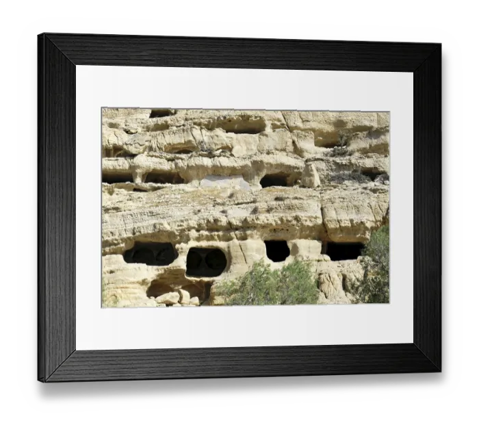 Framed Print : Rock caves, living caves, Matala beach