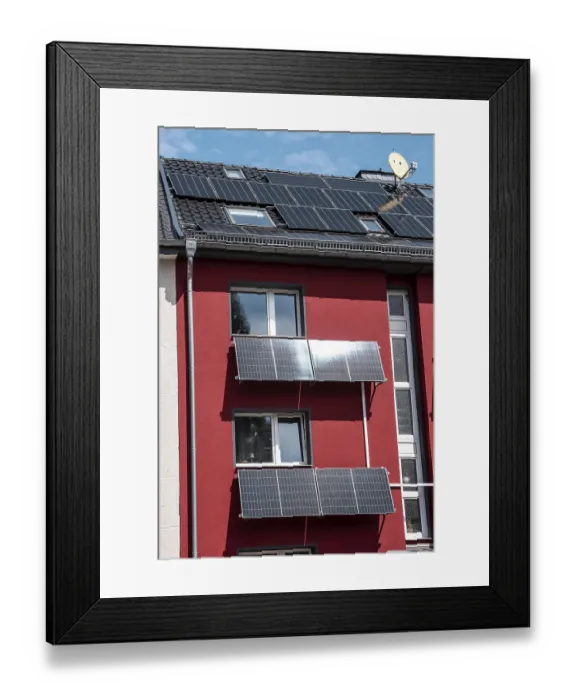 Framed Print : Residential building with photovoltaic modules on the facade and roof