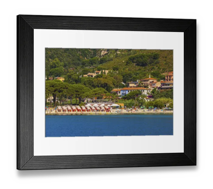Framed Print : Sunbeds and parasols on the beach of Fetovaia