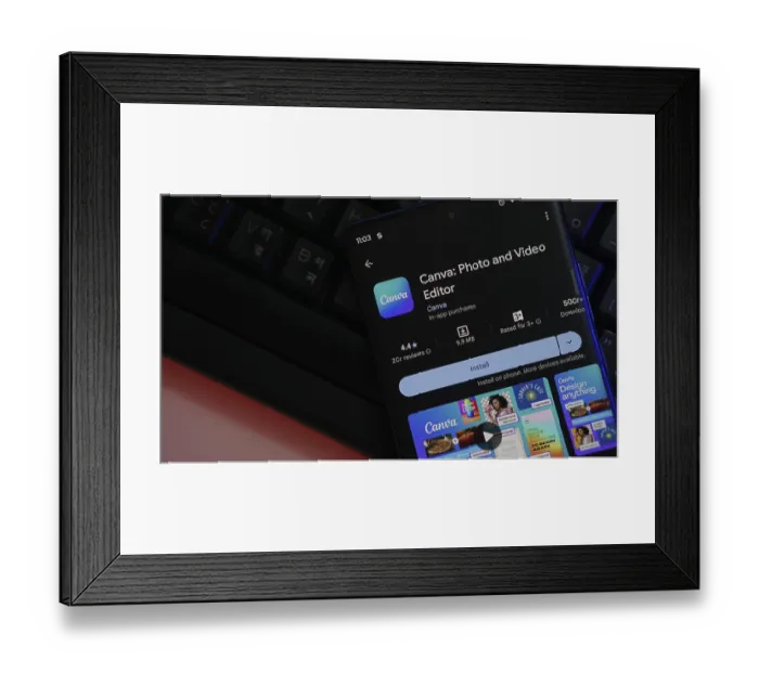 Framed Print : Smartphone displaying Canva app interface with install option