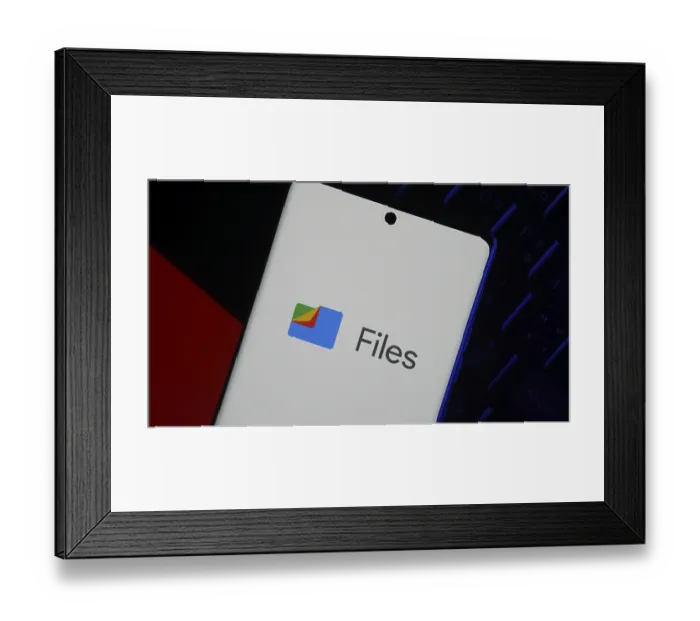 Framed Print : Smartphone displaying Files by Google logo on screen over dark background