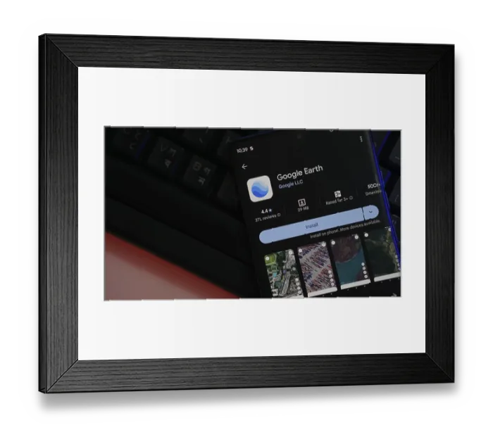 Framed Print : Google Earth app displayed on a phone screen with installation option Framed Print : Google Earth app displayed on a phone screen with installation option