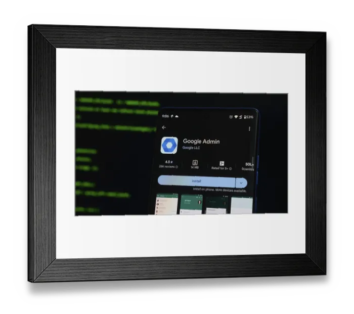 Framed Print : Google Admin app page on a smartphone with a dark background