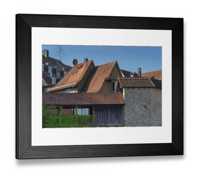 Framed Print : Pointed gable houses with tiled roofs and town wall with battlements Framed Print : Pointed gable houses with tiled roofs and town wall with battlements
