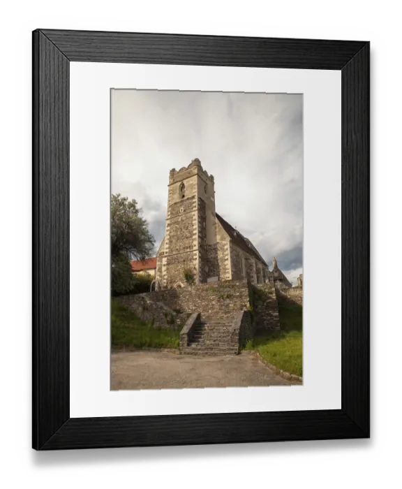 Framed Print : Stone church with a tower