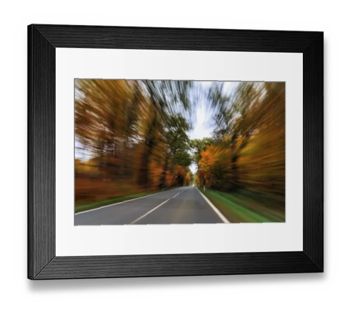 Framed Print : Country road through autumn forest