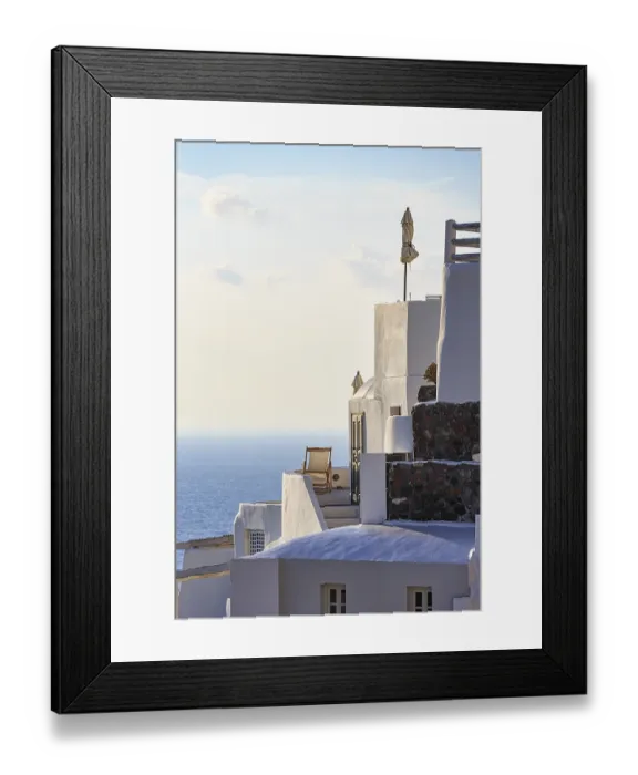 Framed Print : Sun lounger on terrace, holiday home with sea view Framed Print : Sun lounger on terrace, holiday home with sea view