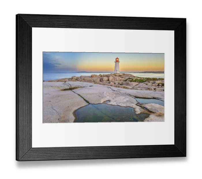 Framed Print : The iconic lighthouse at Peggy's Cove