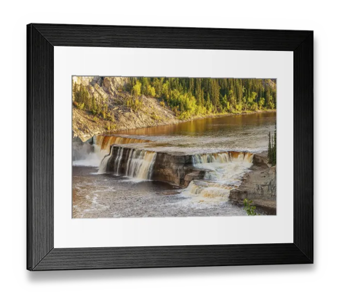 Framed Print : The Hay River cascades over layers of sedimentary rocks at Louise Falls