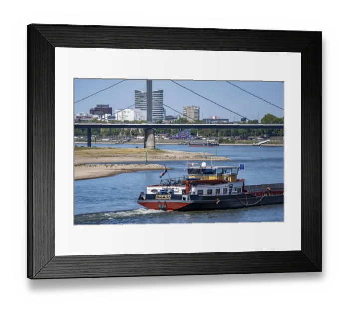 Framed Print : Cargo ship on the Rhine near Dusseldorf