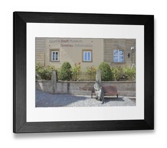 Framed Print : Sculpture of Johann Wolfgang von Goethe sitting on a bench