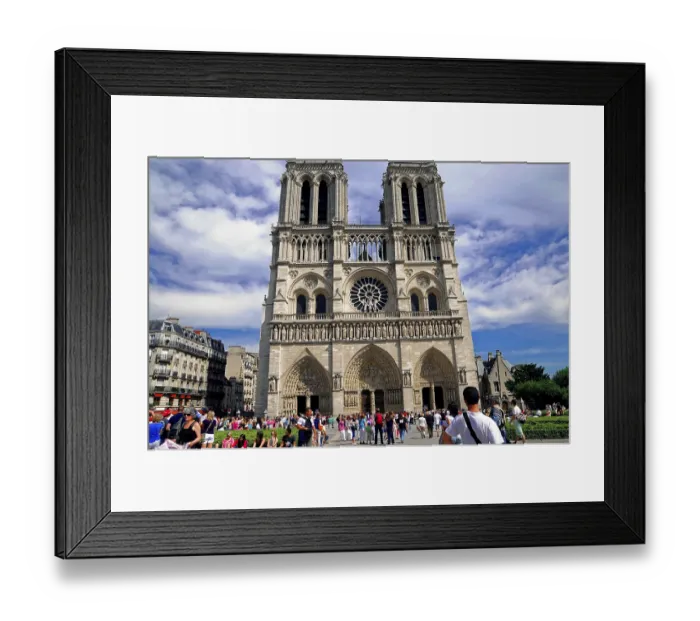 Framed Print : The imposing front of Notre-Dame Cathedral surrounded by numerous people admiring the historic building