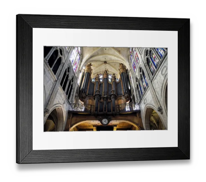 Framed Print : Large pipe organ in a Gothic nave with stained glass windows