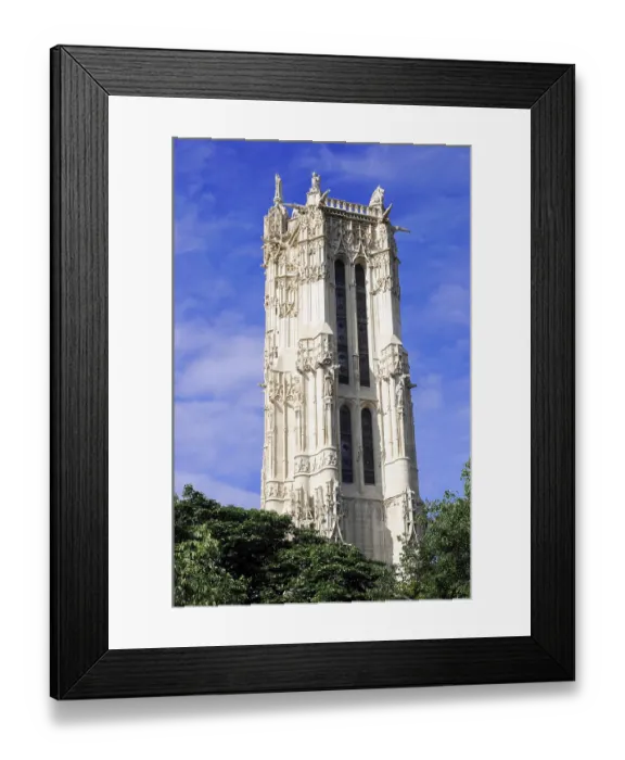 Framed Print : A tall Gothic tower rises against a blue sky