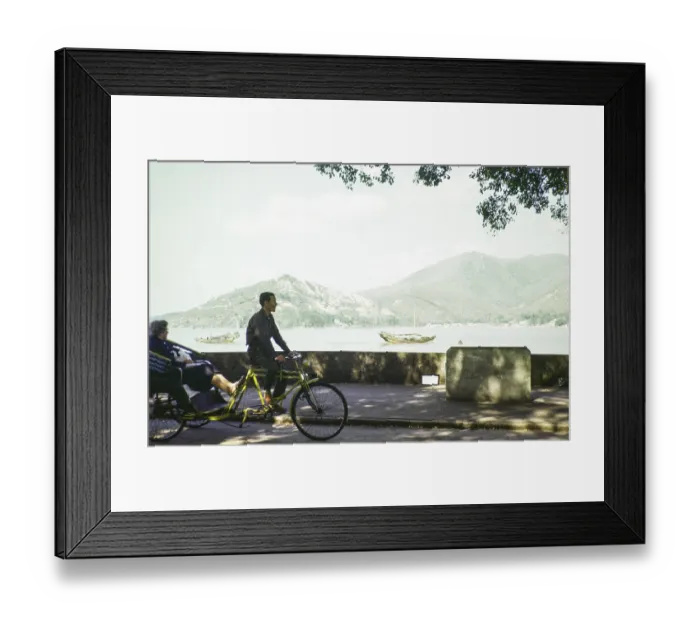 Framed Print : Tricycle rickshaw rider by coastline