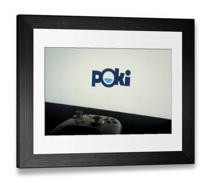Framed Print : A screen showing the Poki logo with a gaming controller in front
